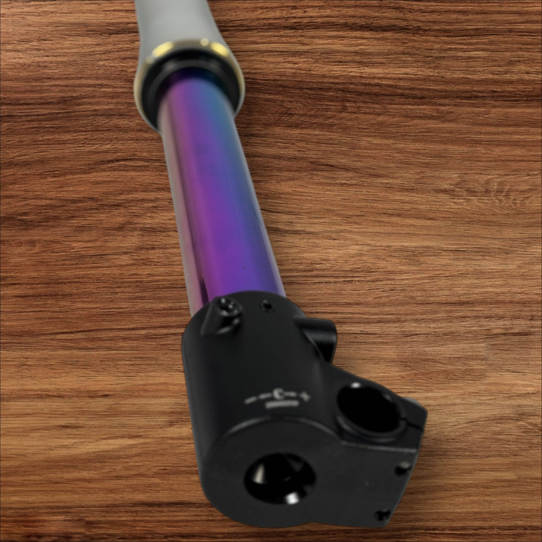 Electro & Co ETM RTR "Oil Slick" forks with multi-color finish, fully adjustable suspension for mountain bikes.