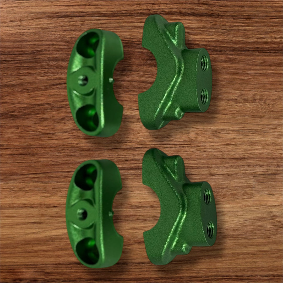 ETM RTR anodized handlebar clamps set by Electro & Co, black, red, blue, green, purple colors, used for securing handlebars.