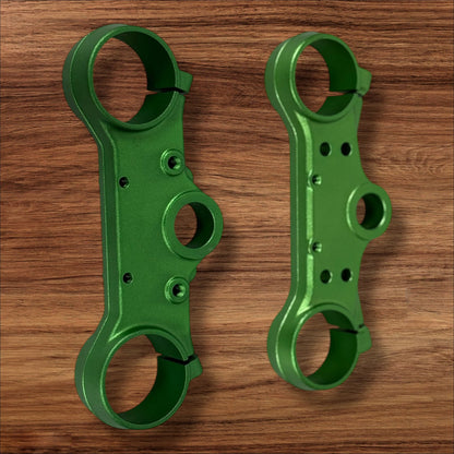 Electro & Co ETM RTR anodized triple clamps, custom color upper and lower replacement clamps for motorcycle handlebars.