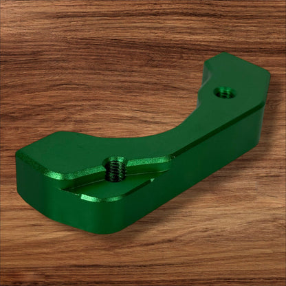 Electro & Co ETM RTR anodized brake brackets set in black, red, blue, green, and purple for front and rear bicycle brake systems