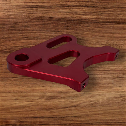 Electro & Co ETM RTR anodized brake brackets set in black, red, blue, green, and purple for front and rear bike brakes.