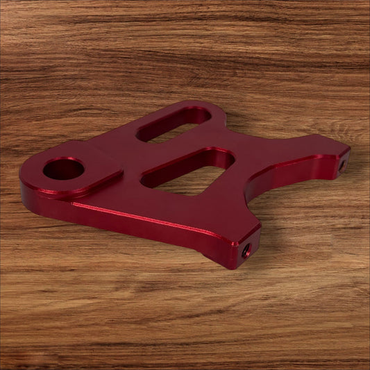 Electro & Co ETM RTR anodized brake brackets set in black, red, blue, green, and purple for front and rear bike brakes.
