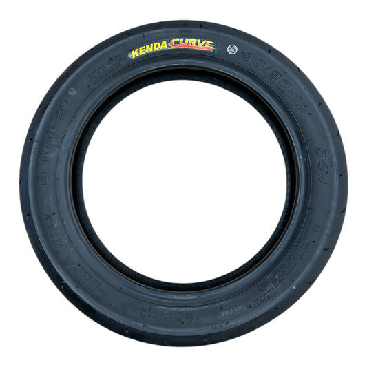 Kenda 90/90-12 supermoto replacement tire on rim, compatible with RTR and Razor wheels, showing tread pattern and sidewall details.