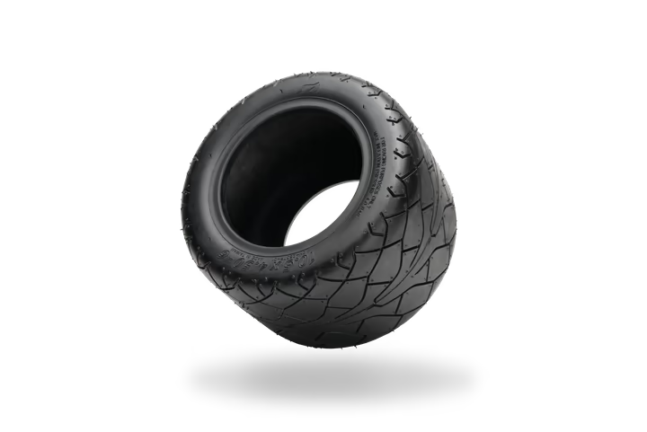 Onewheel Pint performance tire with all-terrain tread pattern, designed for off-road riding on a rugged electric skateboard.
