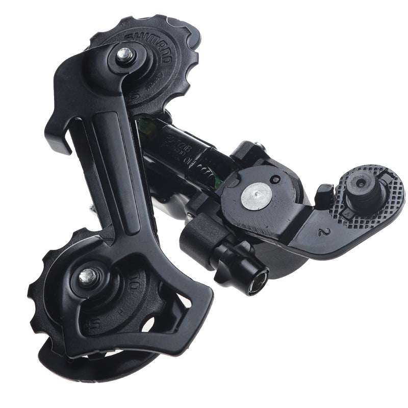 Shimano RD-TY21B bike rear derailleur for 6/7-speed bicycles, mounted on a bicycle gear system.