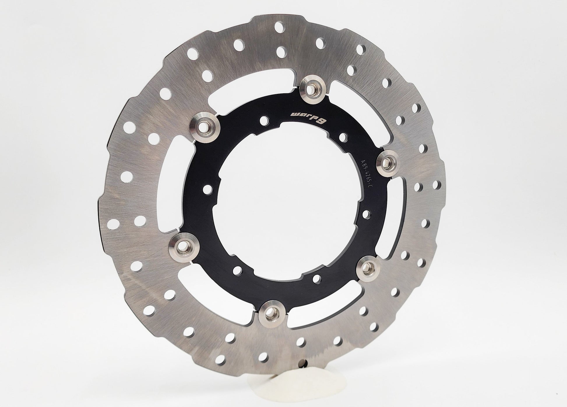 KTM 1090-1290 rear floating brake rotor by Warp9Racing, 265mm diameter, metallic finish with vented design for motorcycle braking system.
