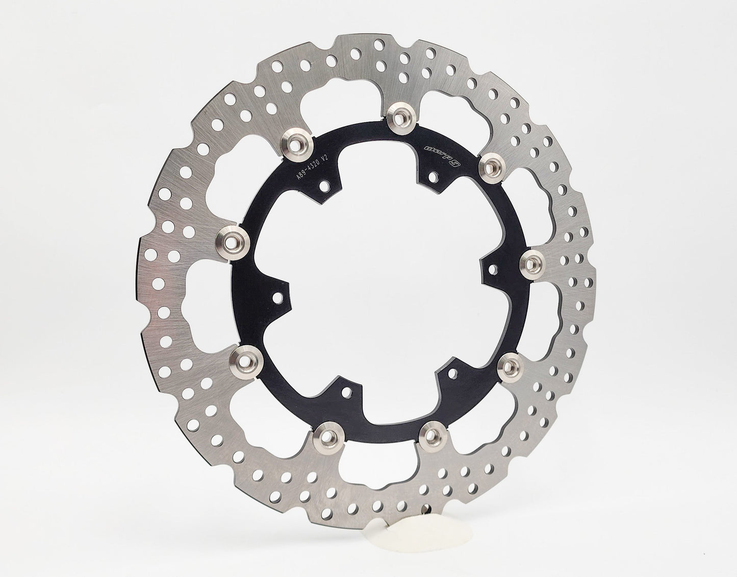 Warp9Racing KTM 790 and 1290 Adventure 320mm front floating brake rotor, close-up view showing detailed rotor surface.