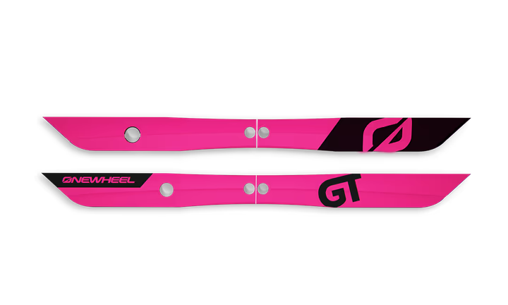 Onewheel GT rail guards in fuchsia color providing scratch protection on the body of the electric skateboard.