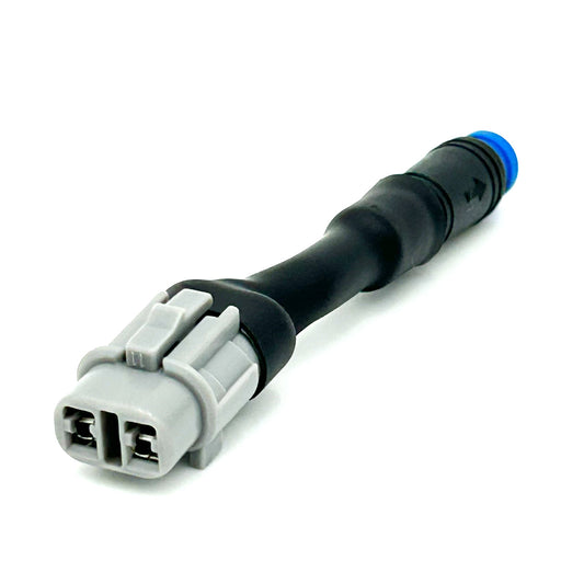 Rawrr Mantis X headlight adapter by eDirtyBike, an electrical component with wiring for motorcycle headlight connection.