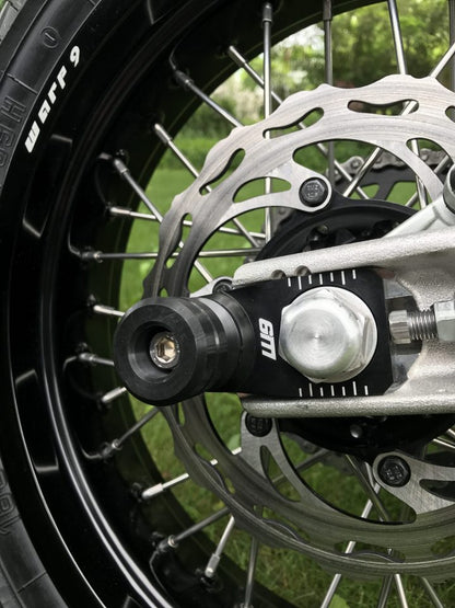 Axle Sliders (Collective) - Howling Moto