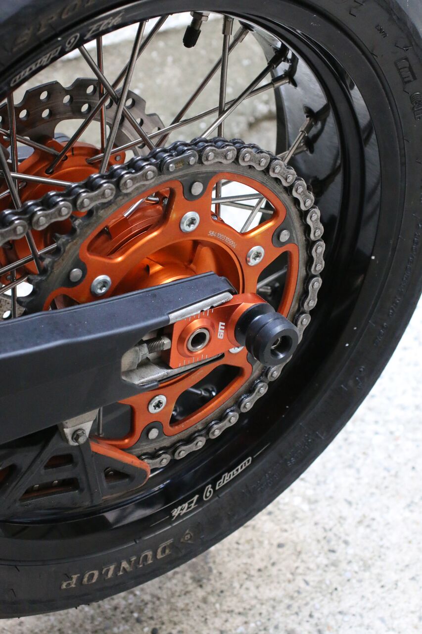 Axle Sliders (Collective) - Howling Moto