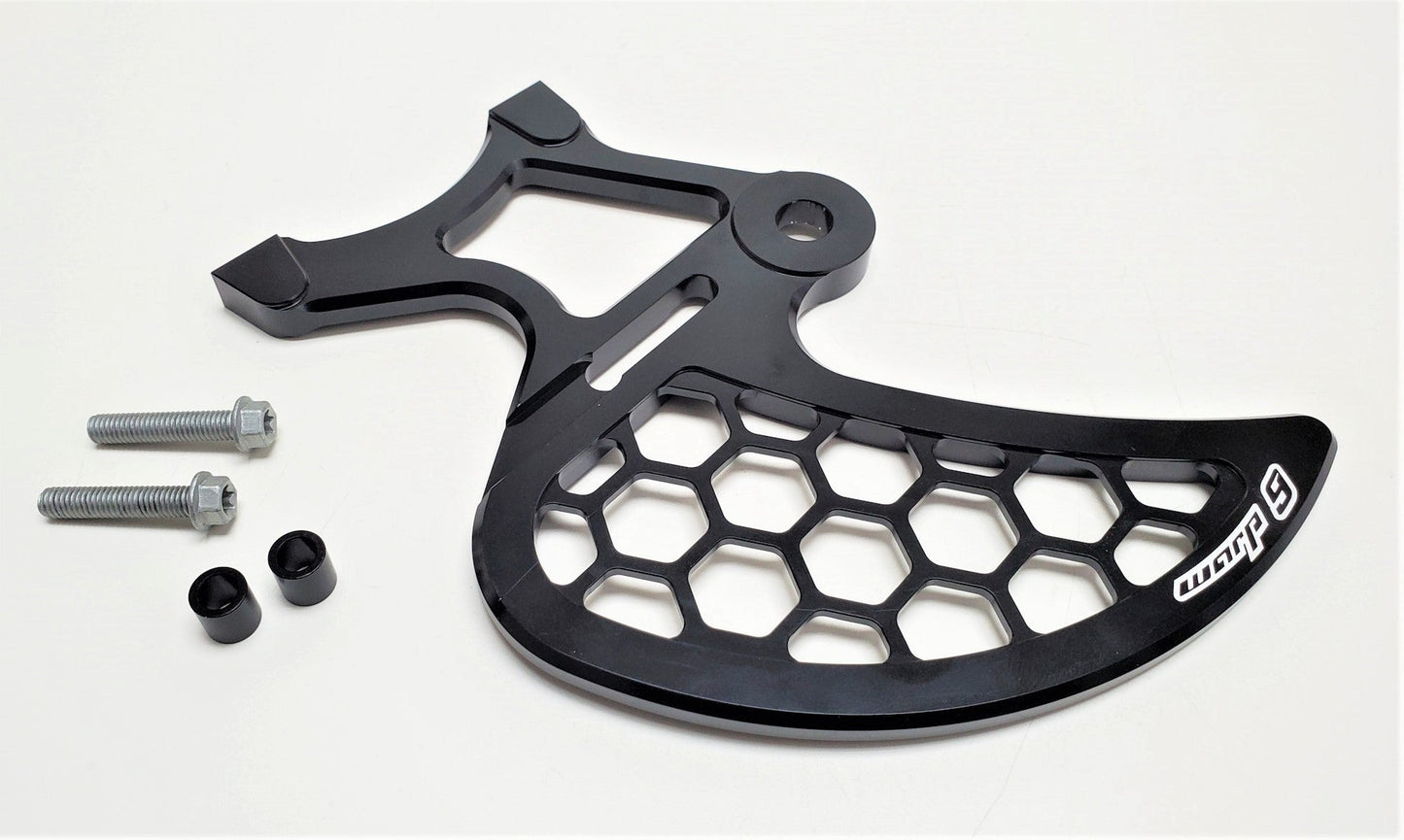 Warp9Racing Surron rear disk guard mounted on the rear brake disc, providing protection with a sturdy metal design.