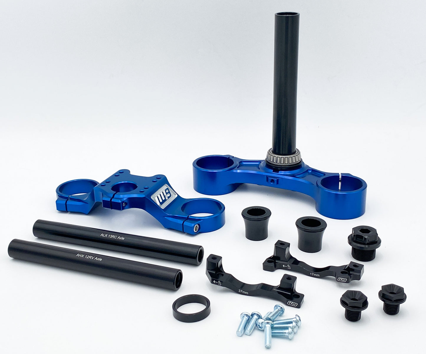 Warp9Racing FastAce Triple Clamps shown in black, featuring a sturdy, precision-machined design for motorcycle handlebar stability.