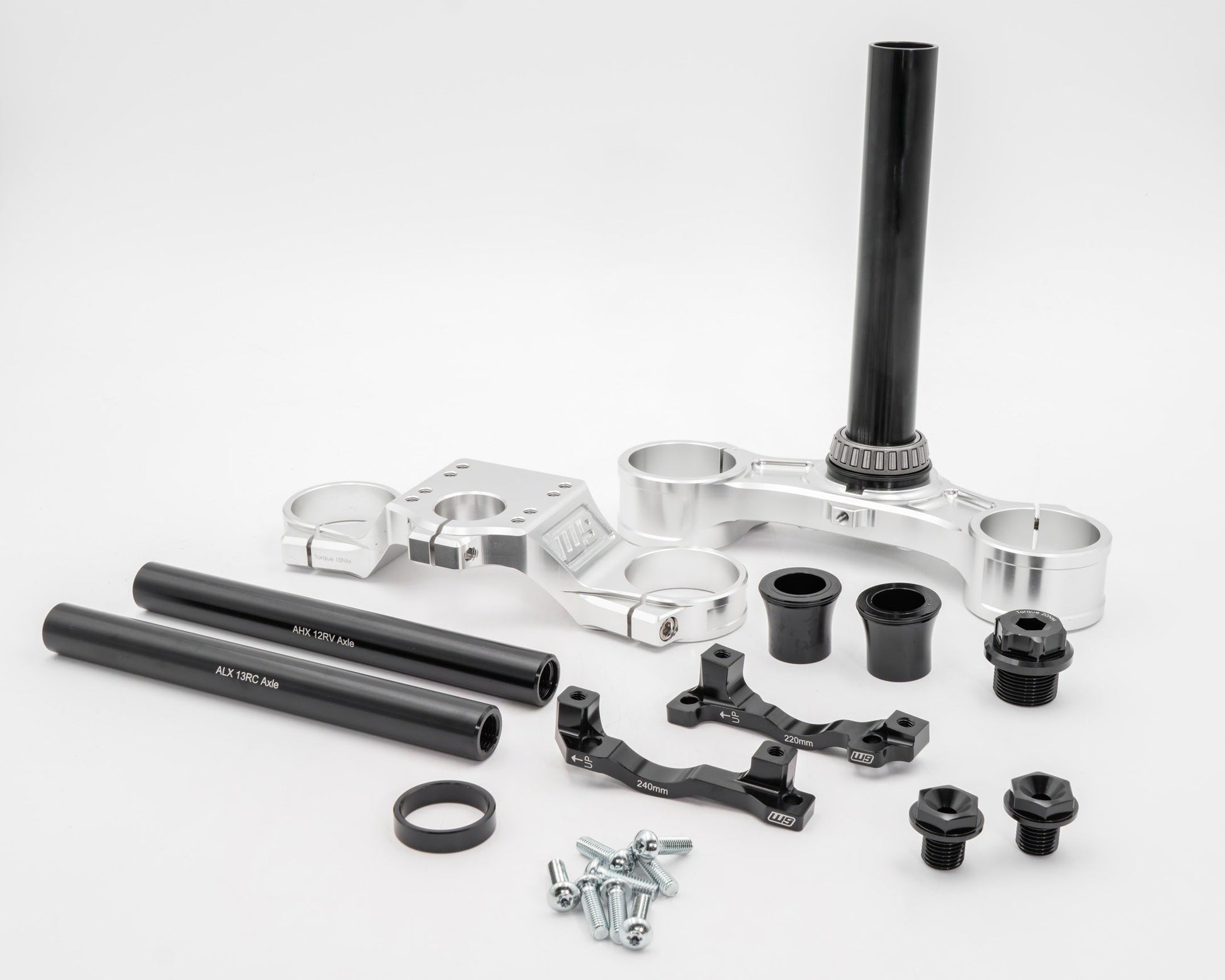 Warp9Racing FastAce triple clamps for motorcycle handlebars, showing the sturdy aluminum construction and sleek design.