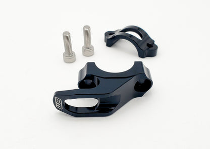 Warp9Racing helmet hook mounted on a wall, designed for easy helmet storage and organization.