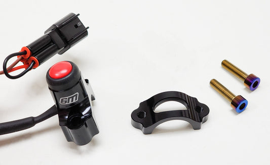 Surron Horn Button by Warp9Racing showing a black motorcycle horn button with wiring and mounting parts.