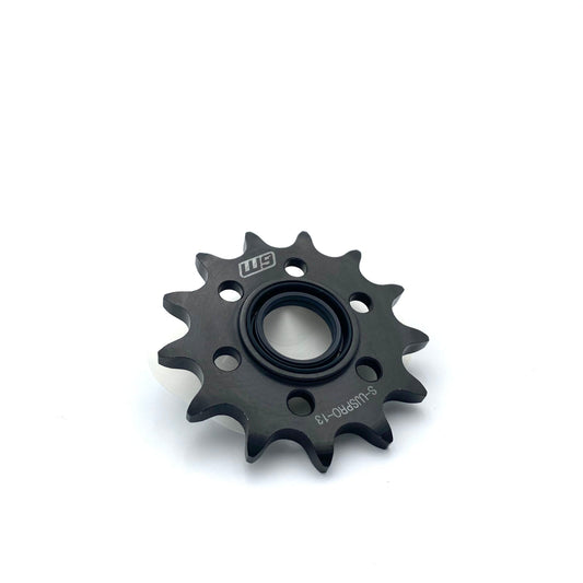 Warp9Racing Ultra Bee Jack Shaft Sprocket mounted on a bike, showcasing precision-machined steel construction for motorcycle drivetrain.