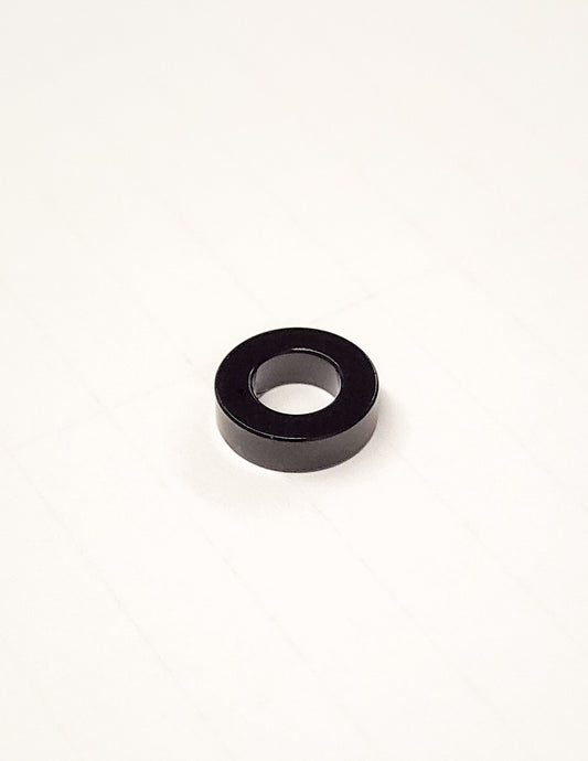 Warp9Racing Ultra Bee Seat Spacer for bike seat adjustment, showing the black spacer with mounting hardware.