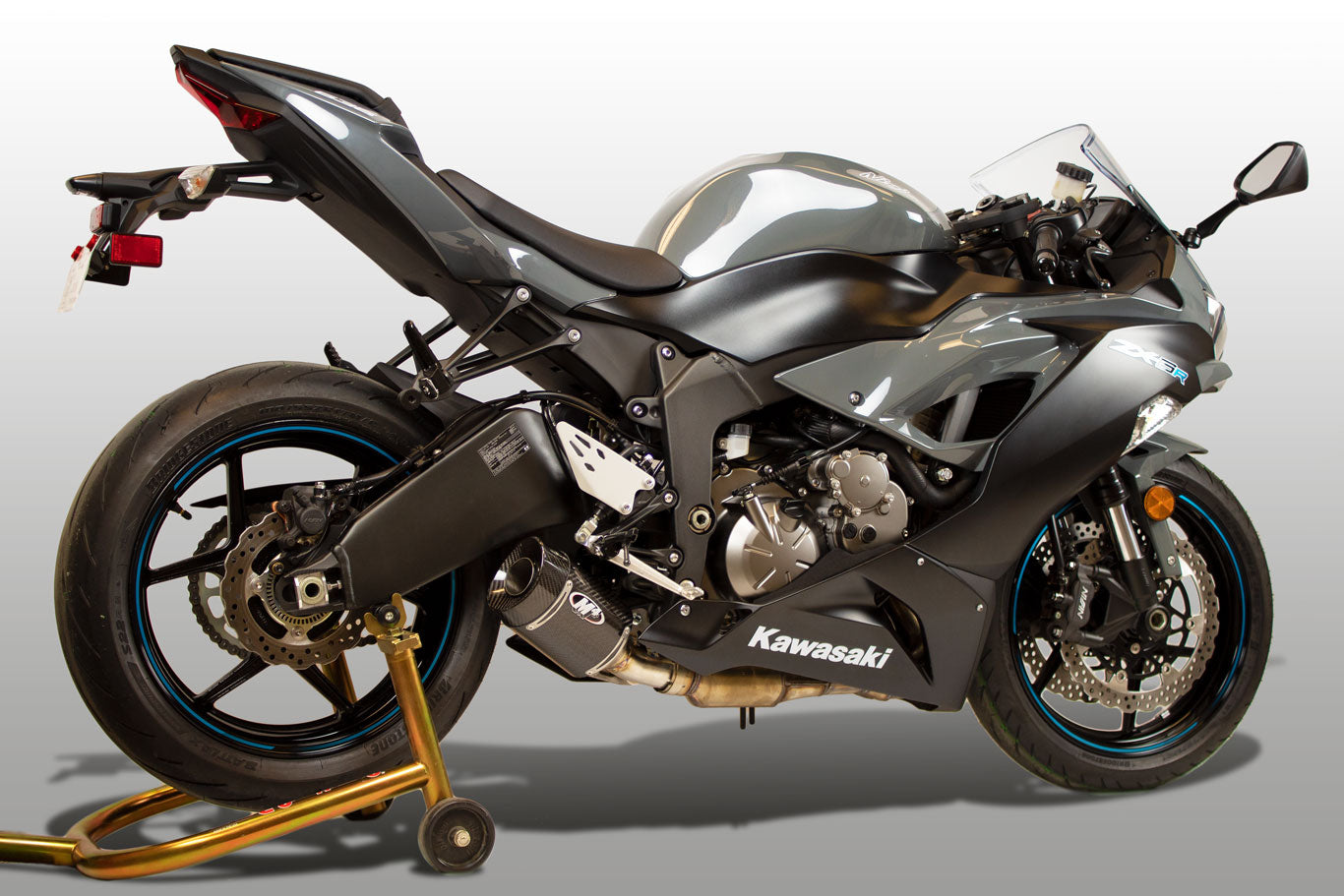 Carbon fiber street slayer slip-on exhaust for M4 ZX6R 2009-2026, by Bill's Exhausts, shown at an angle.