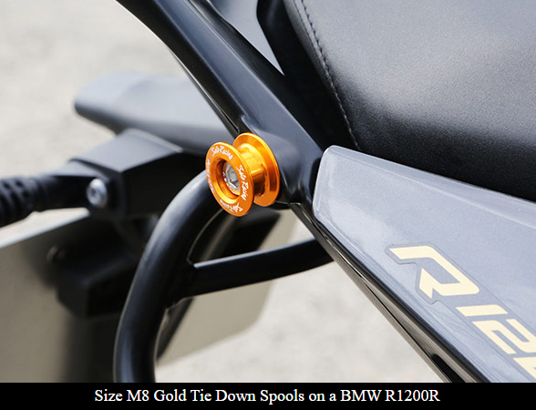 Sato Racing anodized aluminum motorcycle cargo anchors with M6/M8 tie-down spools for secure tie-downs and cargo management.