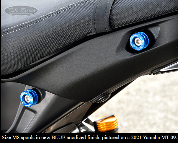 Sato Racing M6/M8 anodized aluminum motorcycle cargo tie-down spools for secure bike transportation and accessories.