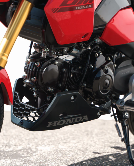Genuine Honda SP under cowl and belly pan for Honda Grom 125 2022+ motorcycle body panel in black.