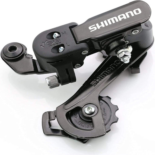 Shimano RD-TZ31A bike rear derailleur for 6/7 speed bikes, mounted on a bicycle, highlighting its direct mount design.