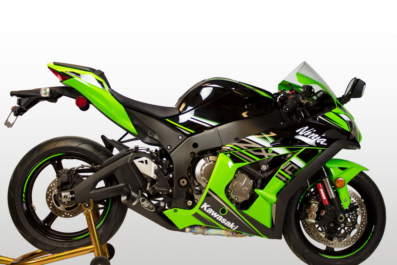 Black M4 GP19 slip-on exhaust for 2016-2020 Kawasaki ZX10, manufactured by Bill's Exhausts, shown in an in-stock product image.