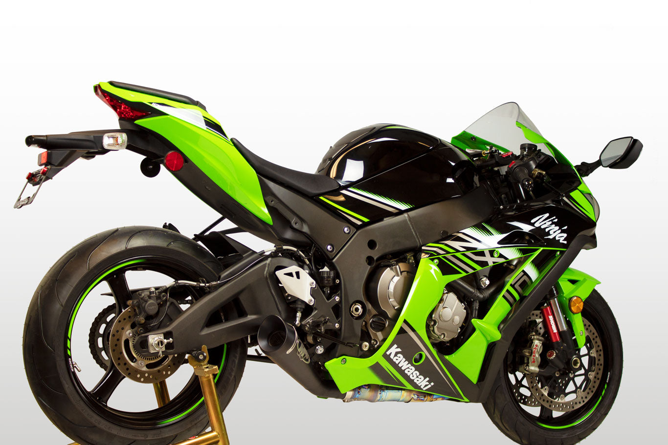 Black M4 GP19 slip-on exhaust for Kawasaki ZX10 from 2016-2020, featuring a sleek design and brand logo, by Bill's Exhausts.