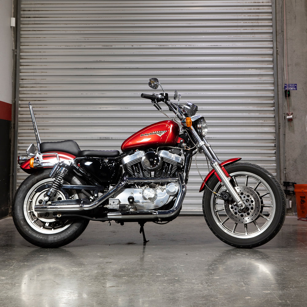 Chrome BILTWELL EXFIL Sissy Bar XL for motorcycle, body-mounted with polished finish, designed by Bill's Exhausts