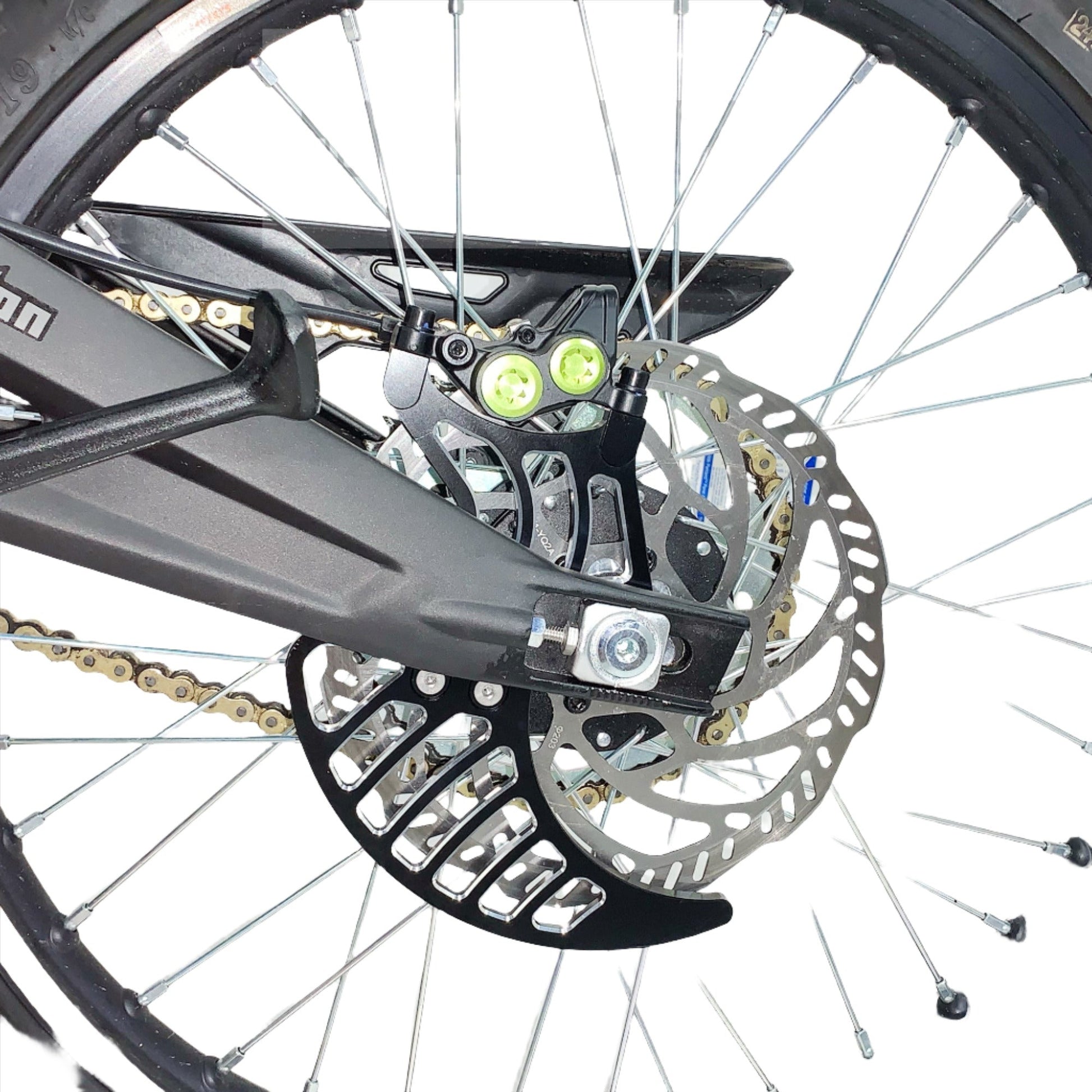 Black aluminum rear brake disk guard for Surron LBX electric bike, designed to protect the brake rotor from debris.