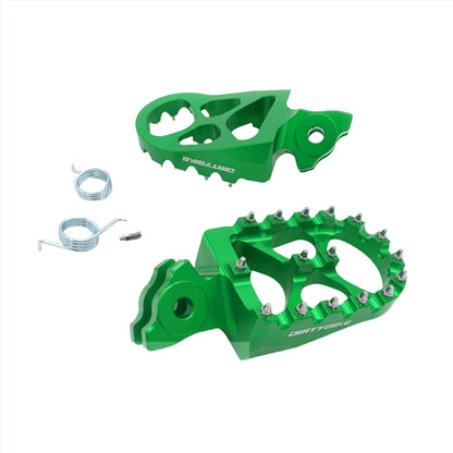 Green CNC aluminum foot pegs for Surron Light Bee DB by eDirtyBike, designed for Talaria MX, X3, and LBX models.