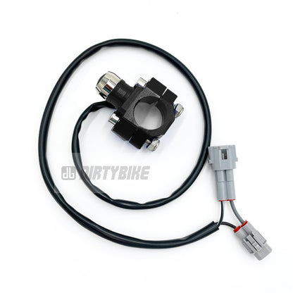 Black headlight switch for Surron LBX and Talaria Sting MX3 eDirtyBike electric bikes, shown in a close-up image.