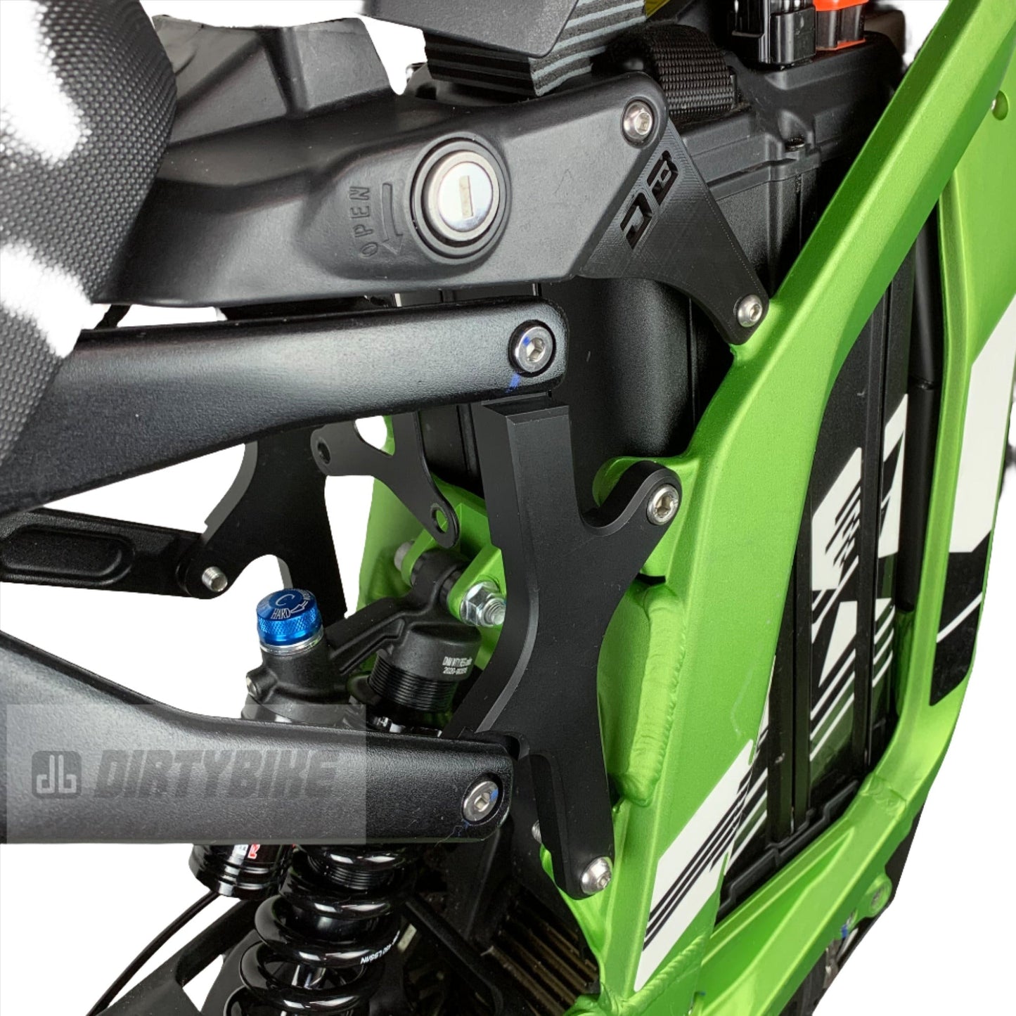 eDirtyBike Surron Light Bee LBX seat riser X-Tension Kit installed on bike, elevating the seat for improved comfort and riding position.