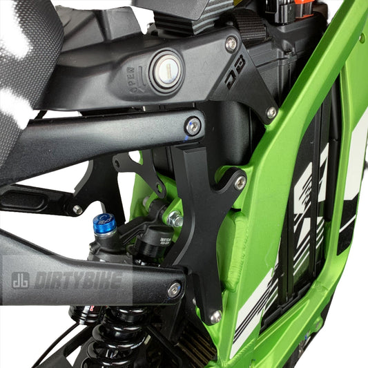 eDirtyBike Surron Light Bee LBX seat riser X-Tension Kit installed on bike, elevating the seat for improved comfort and riding position.