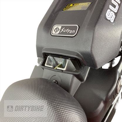 eDirtyBike Surron Light Bee LBX seat riser X-Tension kit installed on the bike, providing added height and improved comfort.