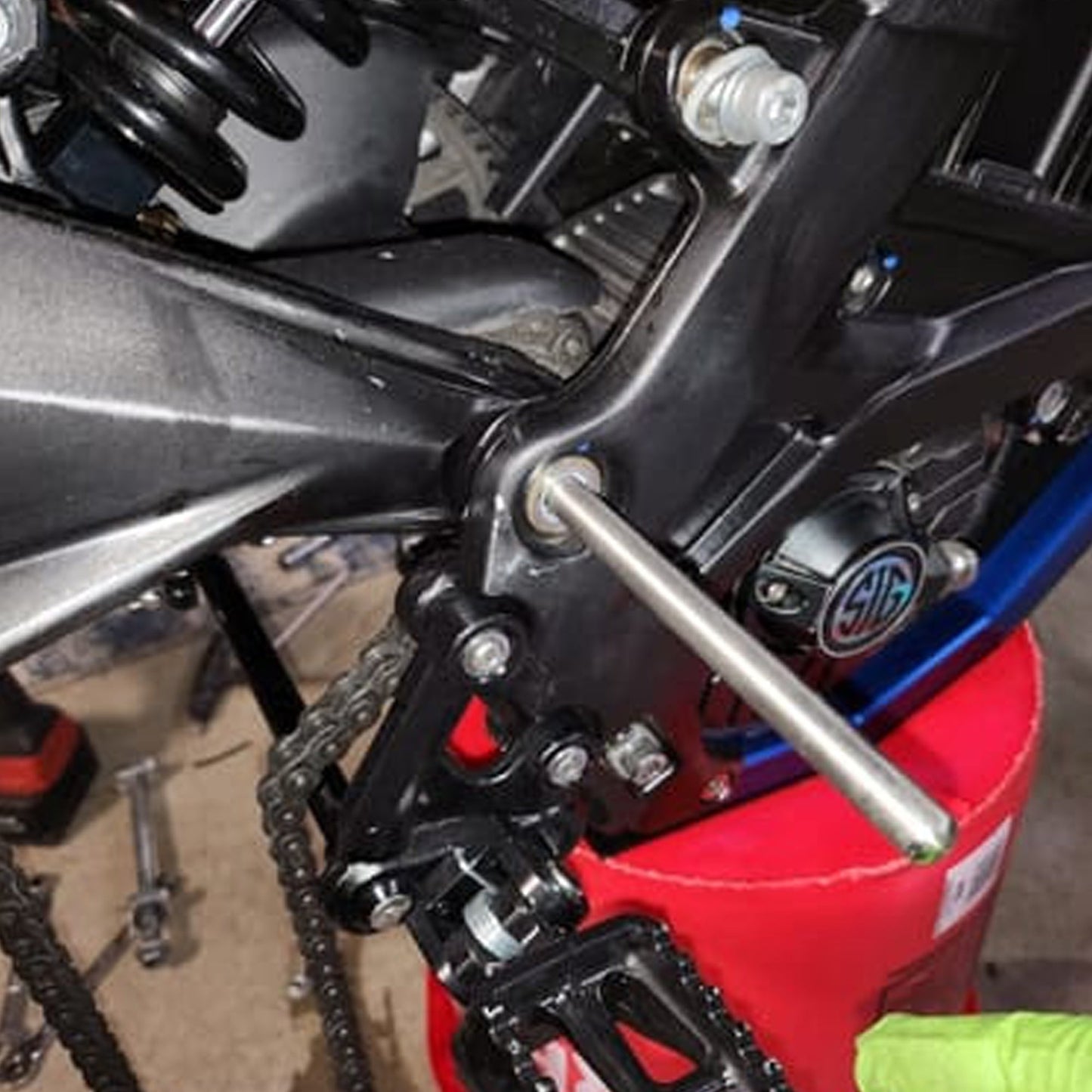 eDirtyBike Surron Light Bee DB mid shaft alignment tool in use, showing precision tool for e-bike motor alignment.