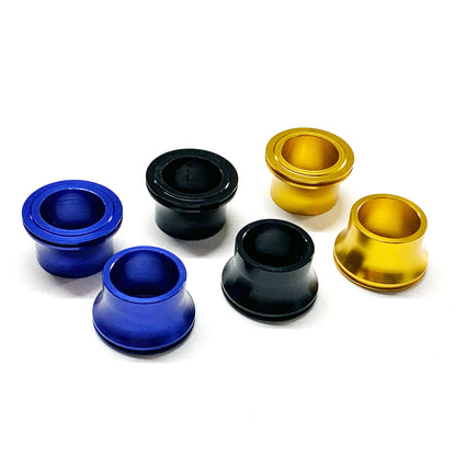eDirtyBike front wheel spacer set for Surron LBX, Talaria Sting, MX3, MX4, and E Ride Pro electric bikes, showing colorful spacers.