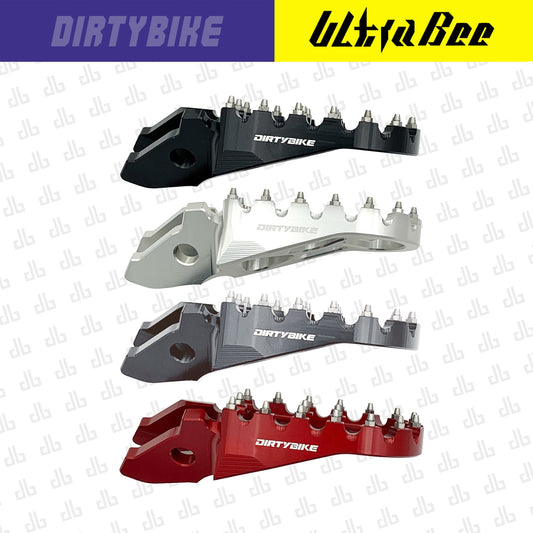 Aluminum CNC heavy-duty foot pegs for Sur-Ron Ultra Bee electric bike by eDirtyBike, featuring textured surface for grip.