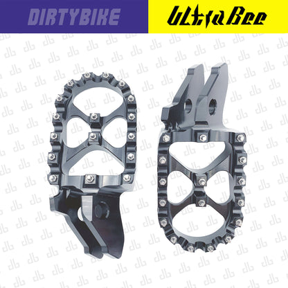 Aluminum CNC heavy duty foot peg for Sur-Ron Ultra Bee electric bike, featuring a durable graphite finish and rugged design.