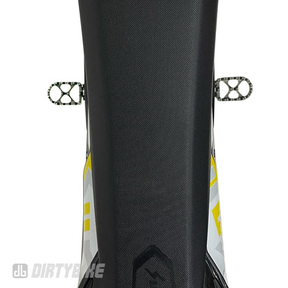 Aluminum CNC foot pegs for Sur-Ron Ultra Bee electric bike by eDirtyBike, mounted on the bike for durable off-road riding.