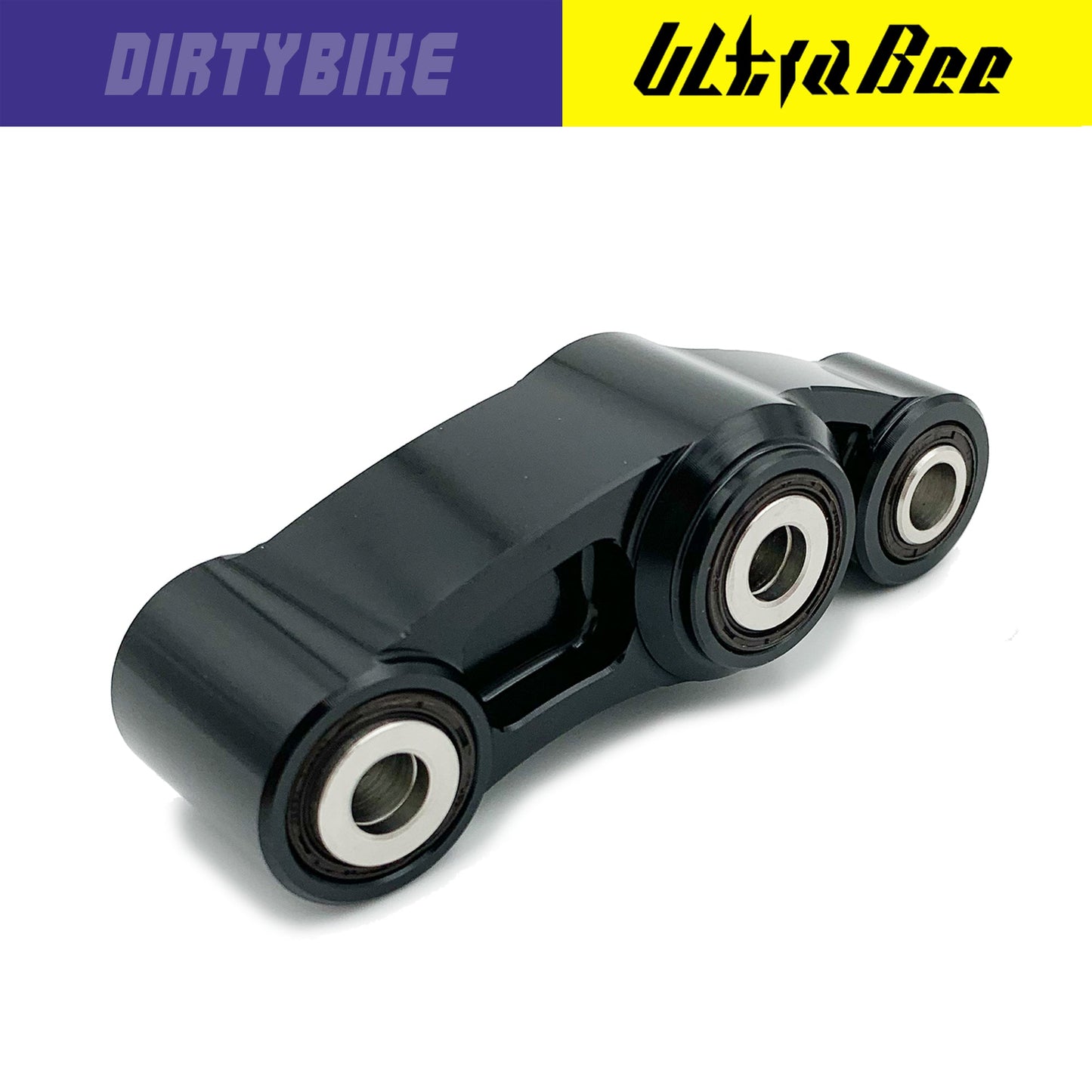 Black CNC aluminum suspension linkage for Surron Ultra Bee eDirtyBike electric bike, showcasing the precision-machined component.