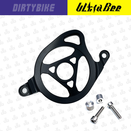Black CNC aluminum motor sprocket cover for Surron Ultra Bee electric bike by eDirtyBike, showcasing durable protective design.