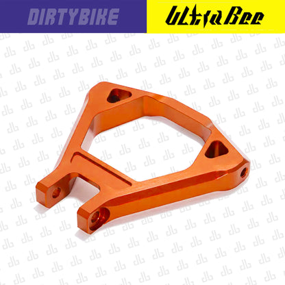CNC aluminum suspension triangle for Surron Ultra Bee eBike, burnt orange color, durable part for improved suspension performance.
