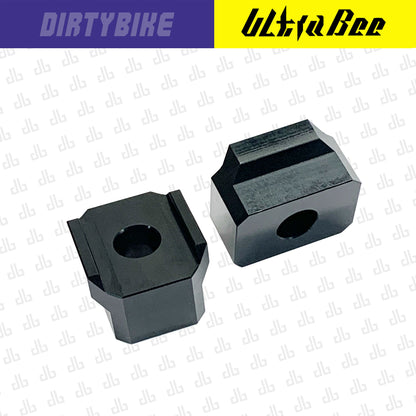 CNC aluminum handlebar riser for Surron Ultra Bee by eDirtyBike, 15mm height increase, shown mounted on electric bike handlebars