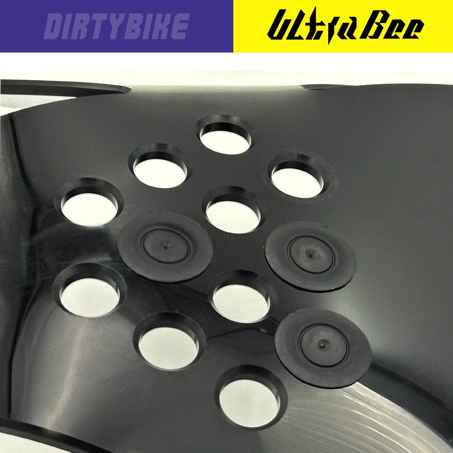 eDirtyBike Hard Enduro skid plate with mud plugs installed on a Surron Ultra Bee electric bike, showing the durable protective component.