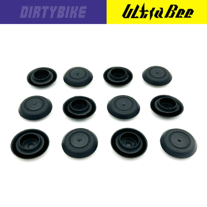 eDirtyBike Hard Enduro skid plate mud plugs for Surron Ultra Bee, durable protective gear for off-road riding.