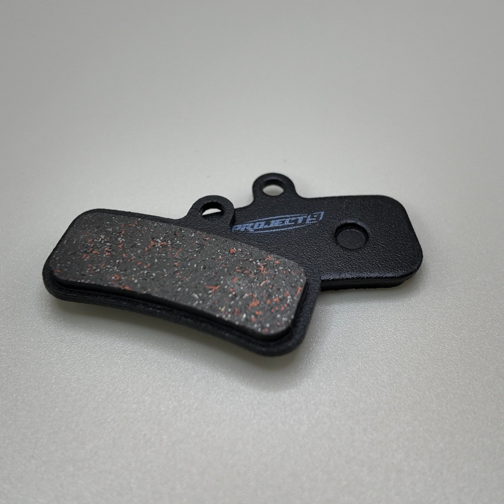 Project9 Eride Pro S/SS ceramic and sintered brake pads for Surron electric bikes, designed for 1.0 and 2.0 models.