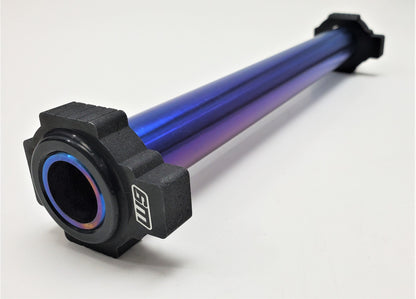 Warp9Racing titanium rear axle for KTM motorcycles, showcasing a durable, lightweight metal component with a polished finish.