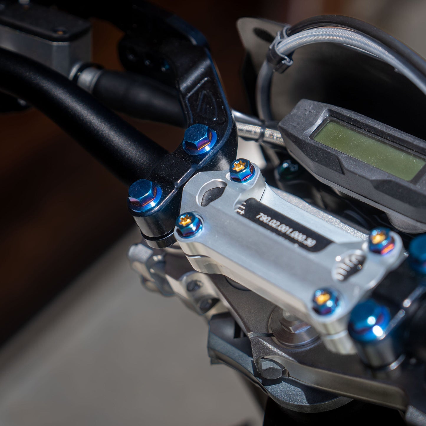 Cycra Titanium Bolt Kit by Warp9Racing featuring lightweight titanium bolts and fasteners for motorcycle or bike assembly.
